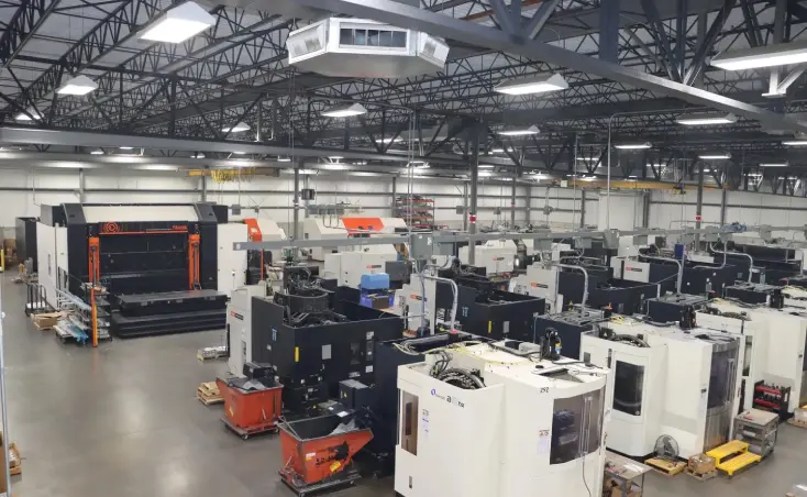 A large warehouse filled with machines and equipment.