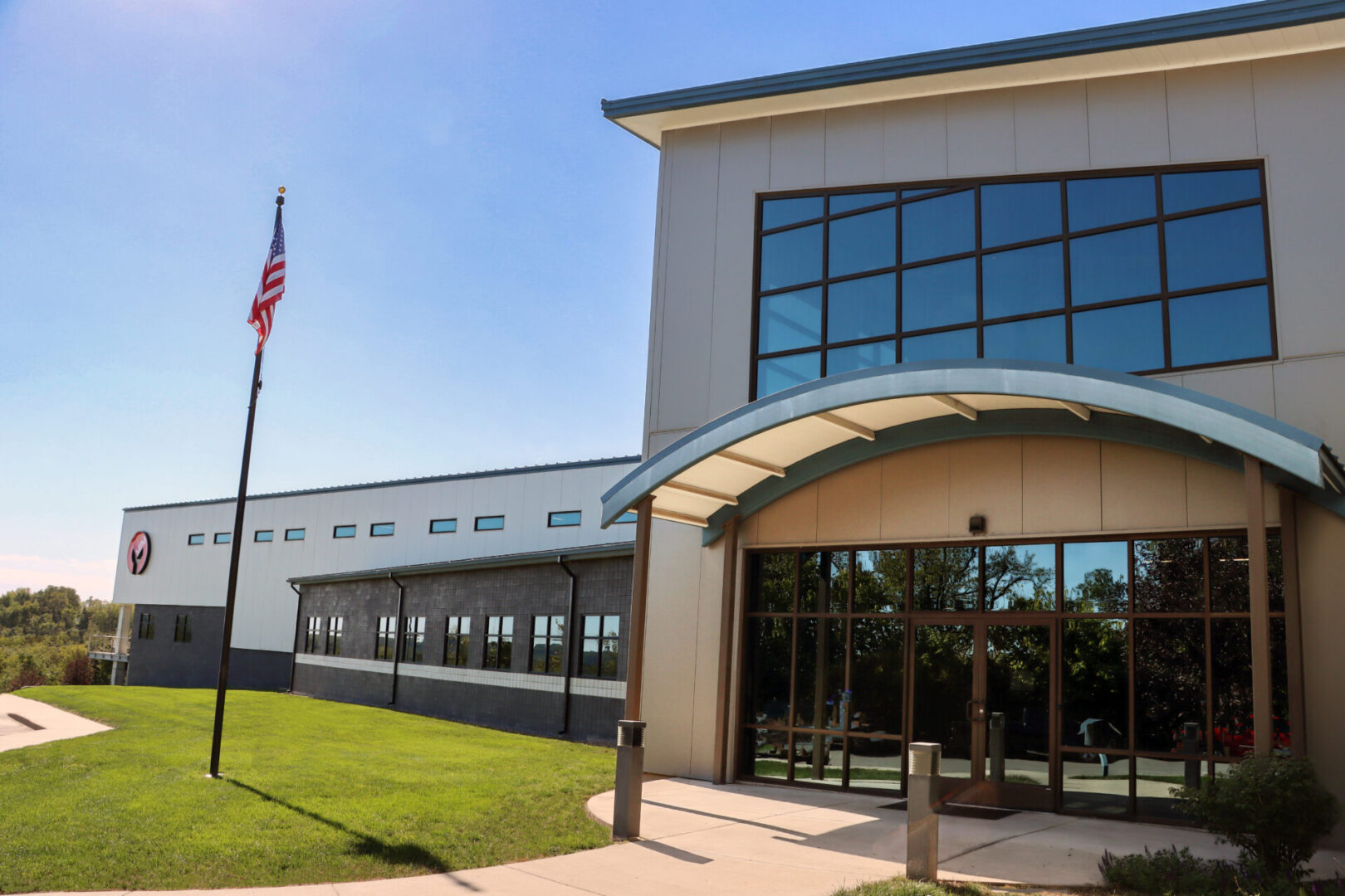 A building with an american flag on the side of it.